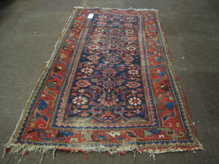 A Caucasian rug with multi row borders (some wear) 69"x36"