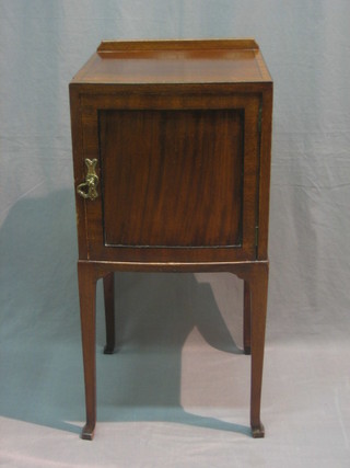 A Georgian style mahogany bow front bedside cabinet raised on square supports 14 1/2"
