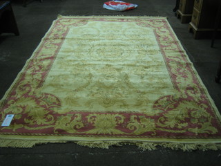 A contemporary Aubusson style gold ground and floral patterned Belgian carpet 86" x 60"