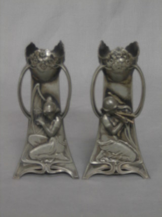 A pair of Art Nouveau WMF style triangular shaped vases decorated ladies playing musical instruments 7"