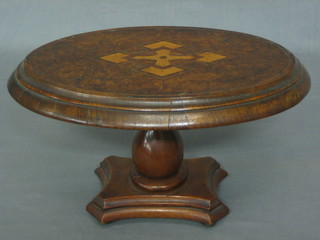 A Victorian miniature figured walnut oval Loo table, raised on a bulbous turned column and triform base, 11"