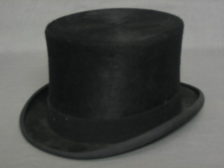 A gentleman's black top hat by Bates of 21 Jermyn Street London, size 7 1/2