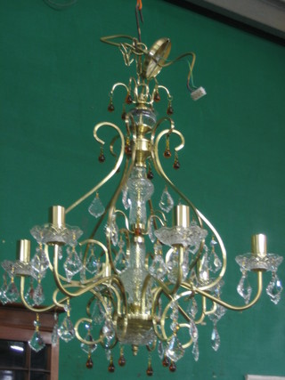 A gilt metal 6 light electrolier with coloured and plain glass lozenges