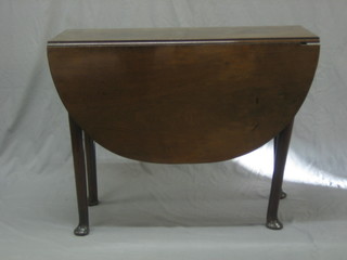 A Georgian mahogany oval drop flap gateleg tea table raised on  club supports 35"