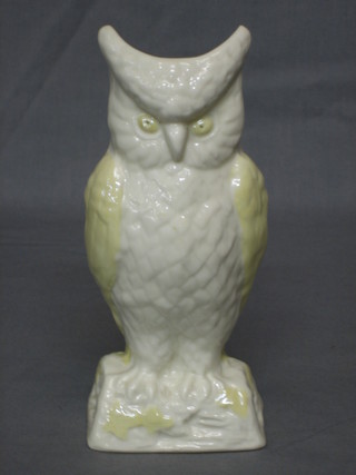 A Beleek figure of a seated owl, the base with brown Beleek mark 9"