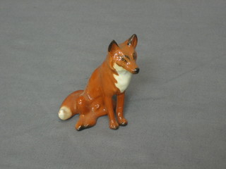 A Beswick figure of a seated fox 3"