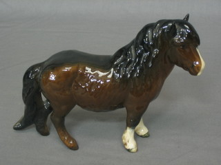 A Beswick figure of a standing Shetland Pony, 6"