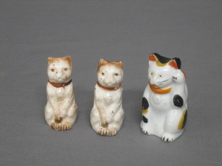 2 19th Century Continental porcelain figures of seated cats 2" and 1 other (3)