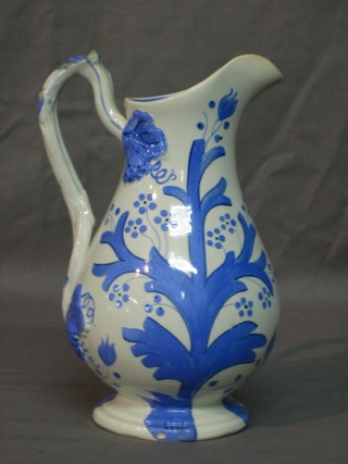 A Victorian Radford pottery jug with blue floral decoration, the base marked Radford, Dundee 8"