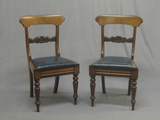 A set of 4 William IV mahogany bar back dining chairs with carved mid rails and drop in seats