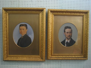 A pair of 19th/20th Century enhanced photographic portrait prints "Lady and Gentleman" 11" oval, contained in gilt frames