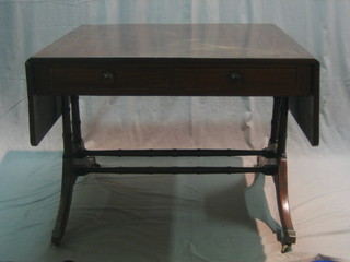 A 19th Century mahogany sofa table fitted 2 drawers, raised on standard end supports with H framed stretcher 36"