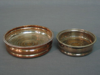 A circular silver salt 5" and 1 other 4"
