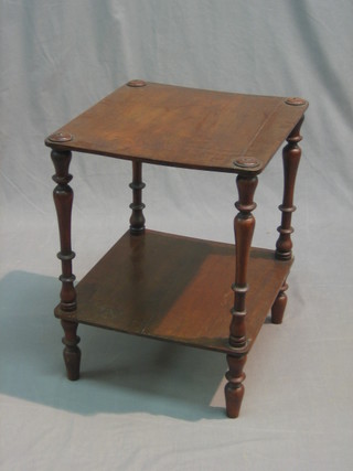 A Victorian square mahogany 2 tier what-not stand, raised on turned supports 15" 