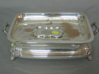 A rectangular silver plated twin handled entree dish base together with a silver plated pin tray marked Clyde Golf Club