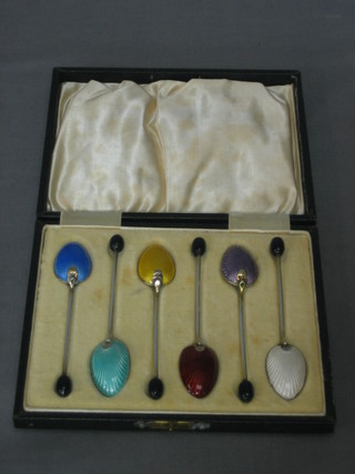 A set of 6 Art Deco silver and enamel backed bean end coffee spoons, Birmingham 1933, cased