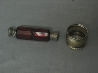 A Victorian red glass double ended scent bottle with silver lid 4", together with a silver napkin ring