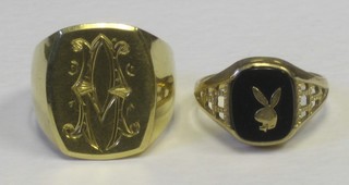 A gold signet ring and 1 other (2)