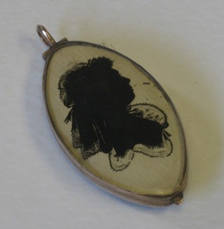 A 19th Century double sided gilt metal mourning locket containing a hair sculpture and silhouette