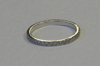 A small 18ct white gold eternity ring set diamonds