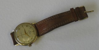 A gentleman's automatic wristwatch by Hamilton contained in a 14ct gold case
