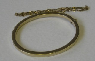 A lady's 9ct gold bangle together with a 9ct gold bracelet