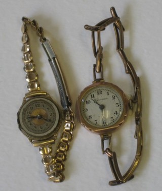 A lady's gold cased wristwatch and 1 other