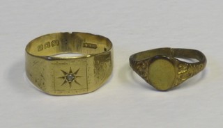 An 18ct gold signet ring together with a gilt metal signet ring