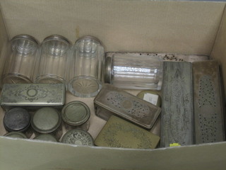 A collection of various glass dressing table bottles with silver plated lids