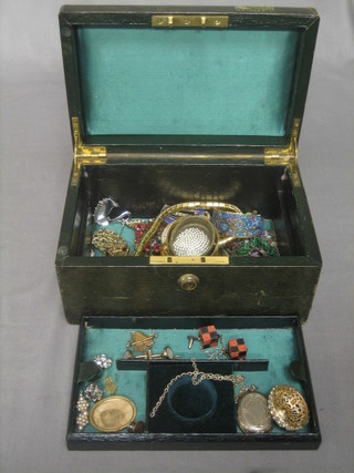A Victorian leather covered jewellery box containing a quantity of various costume jewellery