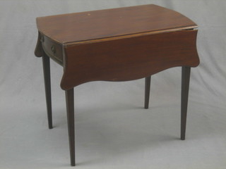 A 19th/20th Century shaped mahogany Pembroke table, fitted a frieze drawer and raised on turned and fluted supports 30"