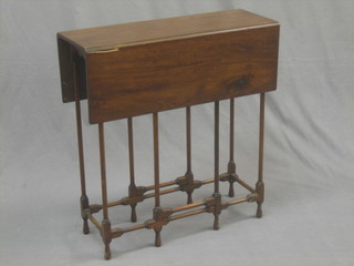 A 19th Century mahogany drop flap Spider leg table 27"