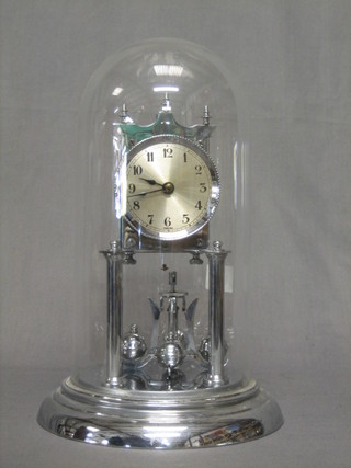 A Continental chromium plated 400 day clock with silvered dial and Arabic numerals, complete with dome