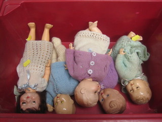 A Rosebud doll and 4 other dolls