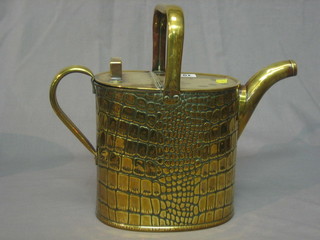 A Victorian oval planished brass hotwater carrier