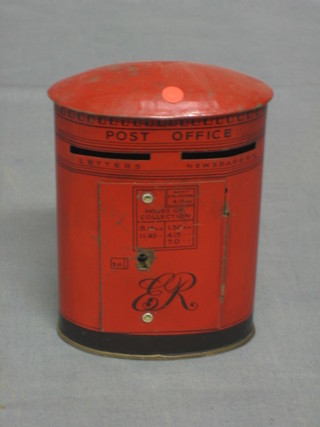 A Chad Valley money box in the form of a pillar box marked ER 3 1/2"