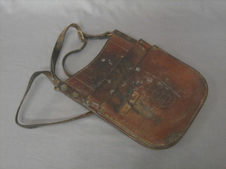 A London Transport bus conductor's leather pouch together with 11 various bus ticket clips