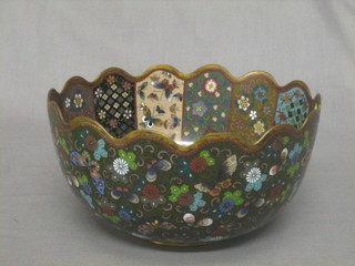 A 19th Century blue and floral patterned cloisonne enamelled bowl the centre decorated a fabulous bird 8"