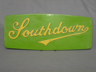 A yellow plastic bus "radiator badge" marked Southdown 14"