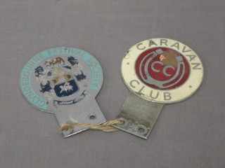 A Glyndebourne Festival Society car badge No. 703 together with a Caravan Club car badge