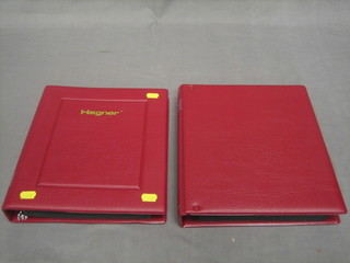 2 plastic red ring binder albums of stamps Netherlands and China