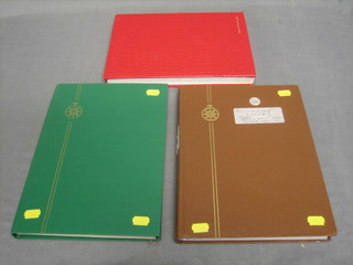 A red Linder stock book of World stamps, a brown stock book of Central America and a green stock book of World stamps