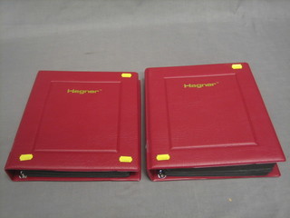 2 red plastic ring binder albums of  World stamps