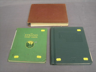 A Stanley Gibbons green Britannia album of stamps, a green Standard album of stamps and a brown album of various World stamps