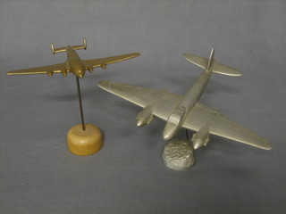 A gilt painted metal model of a Dehavilland Albatross together with a model of a Mosquito