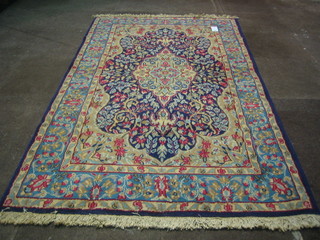 A contemporary Kyamon rug with central medallion within multi row borders 83"x49"