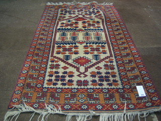 A contemporary white ground Eastern rug with all-over geometric design 74" x 43"