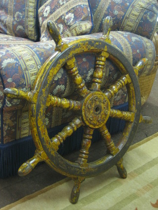 An ornamental 8 spoked ships wheel 33"