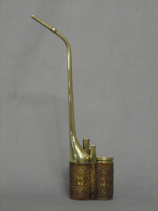 An Eastern brass opium pipe