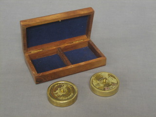 A perpetual calendar together with a World Time indicator contained in a hardwood case